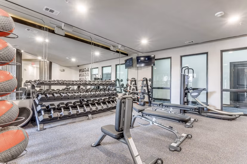 fitness center at The Armstrong at Knox Apartments