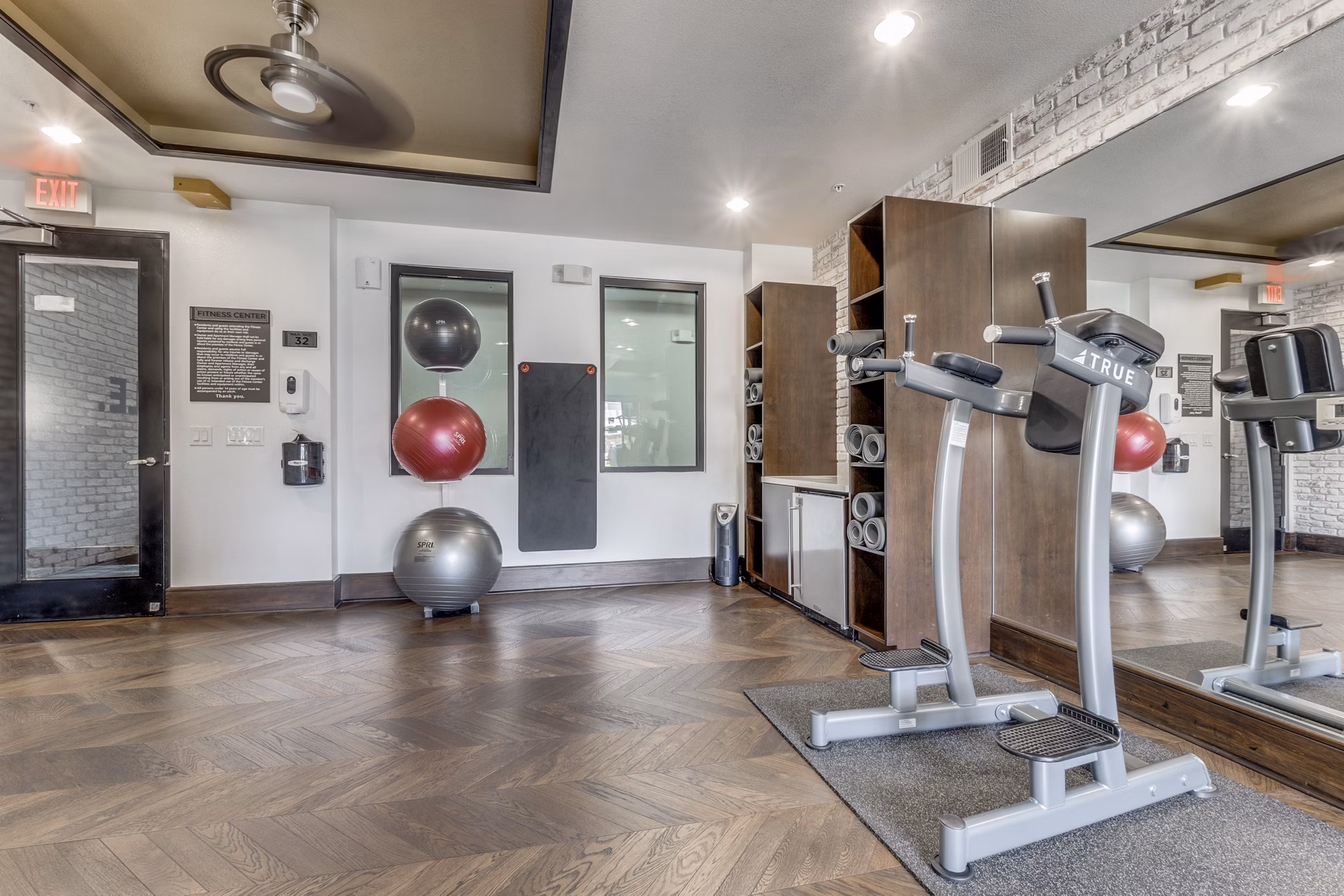 fitness center at The Armstrong at Knox Apartments 