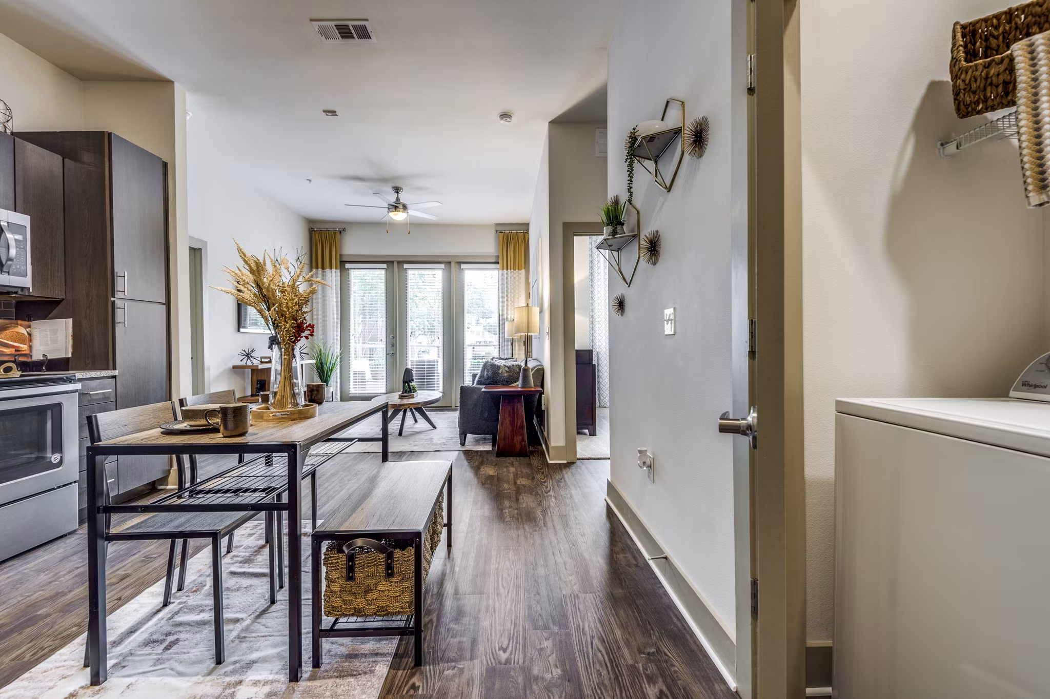 kitchen, dining area and laundry area at The Pierpont Apartments
