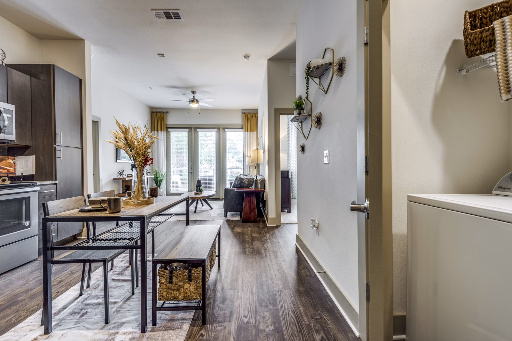kitchen, dining area and laundry area at The Pierpont Apartments
