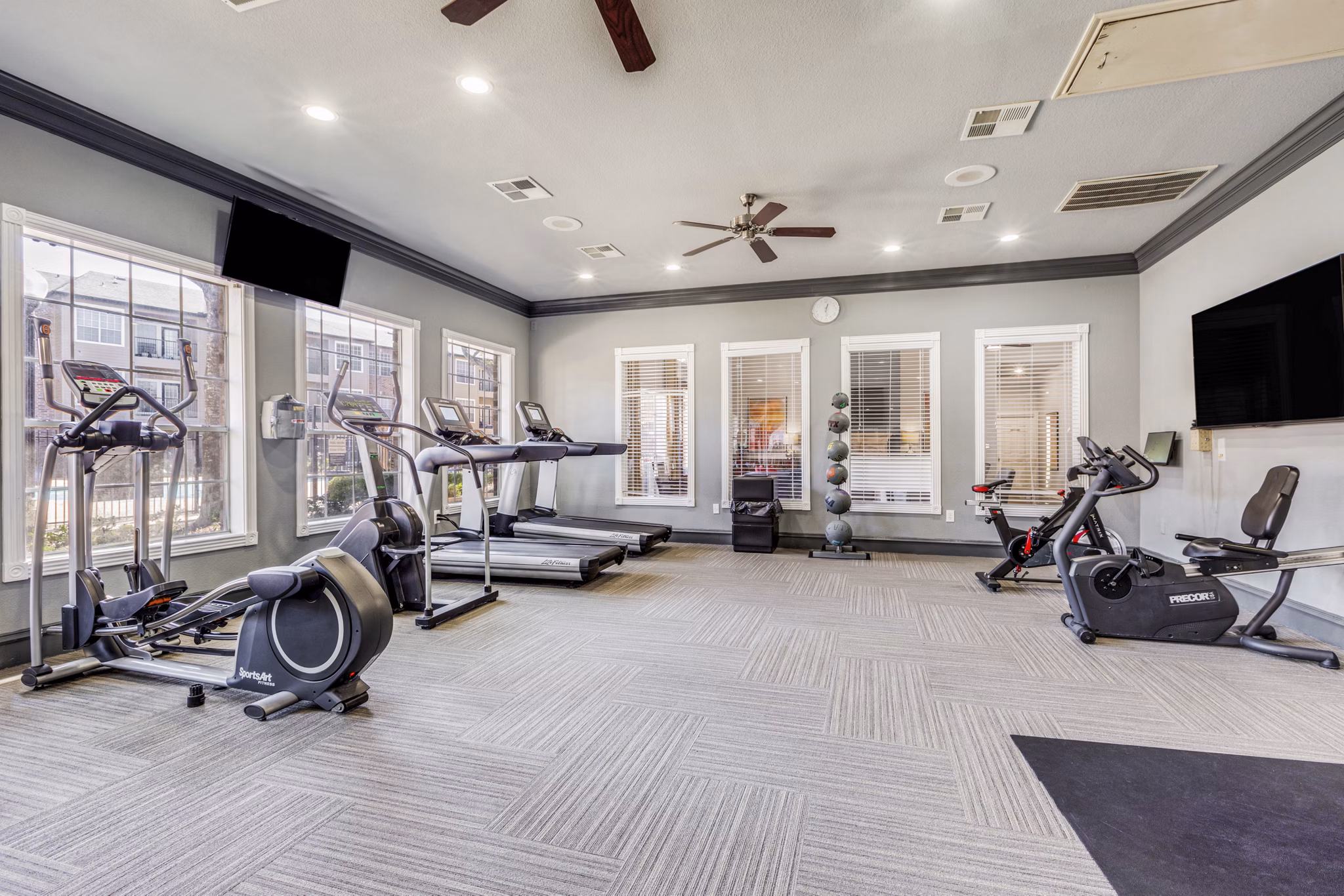 fitness center at The Trestles Apartments