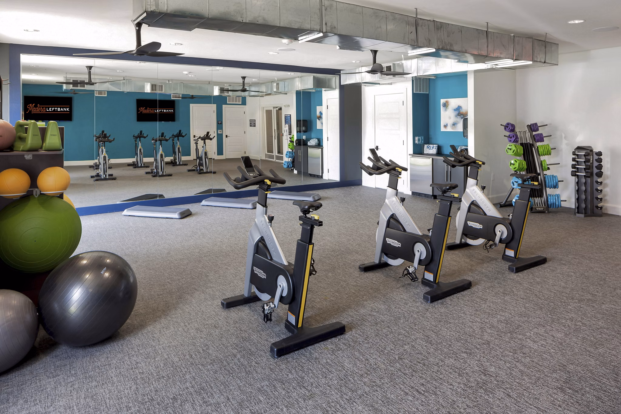 fitness center at Madera at LeftBank Apartments