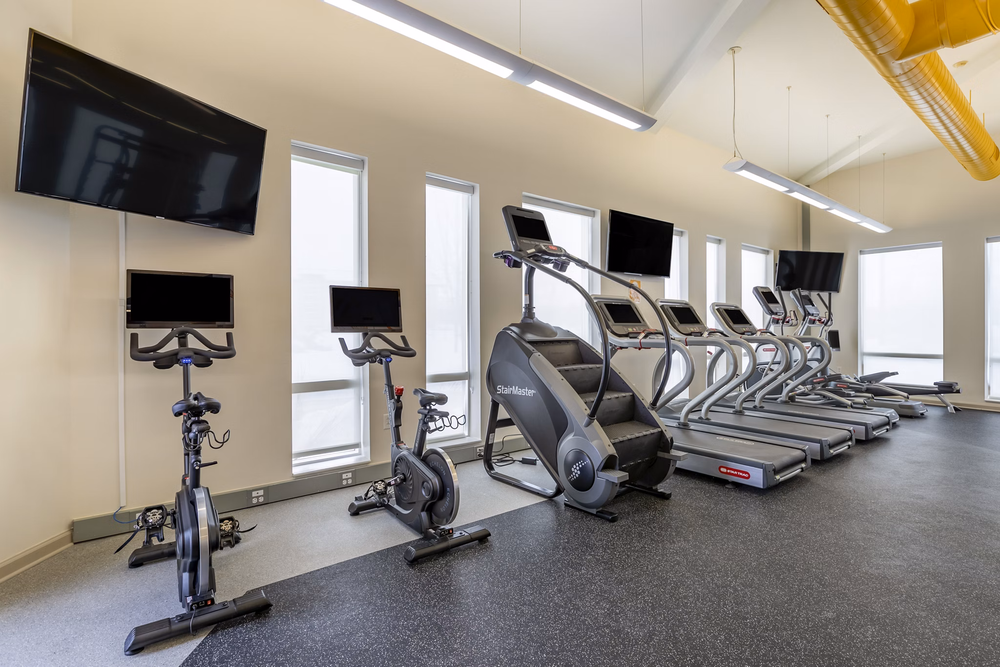 fitness center at Aspire at West Campus Apartments