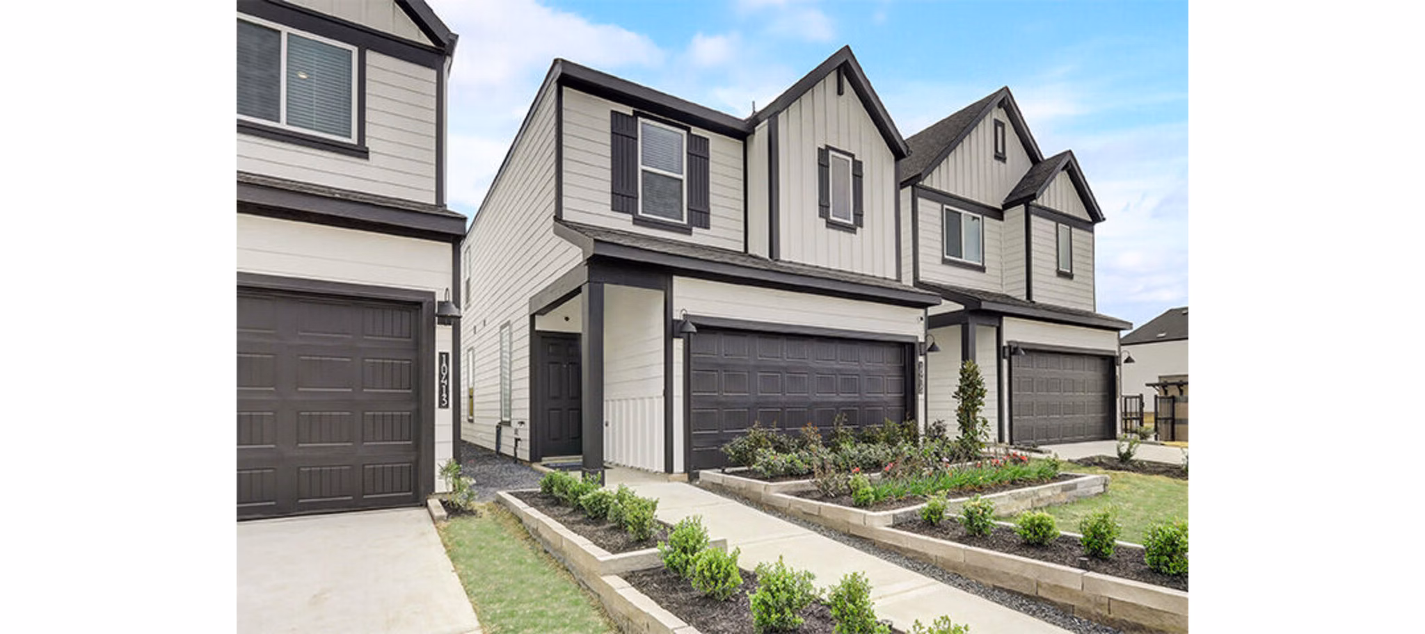 building/exterior at The Oaks at Grand West Apartments