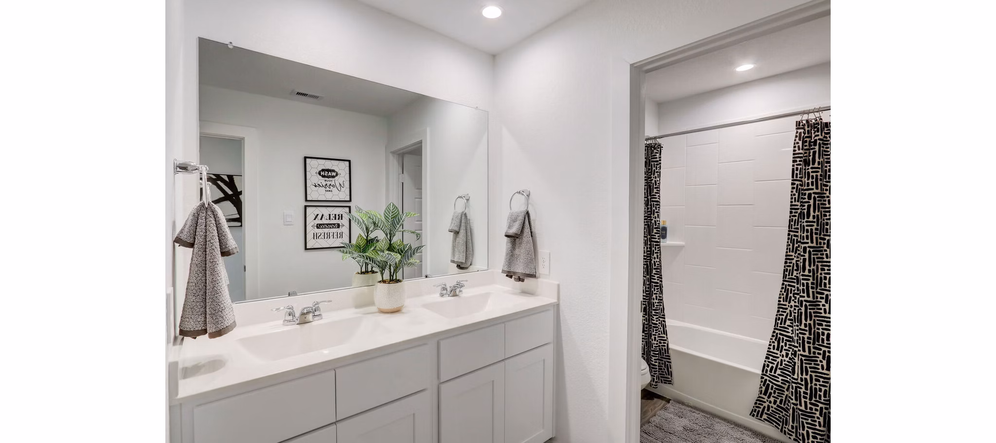 bathroom at The Oaks at Grand West Apartments