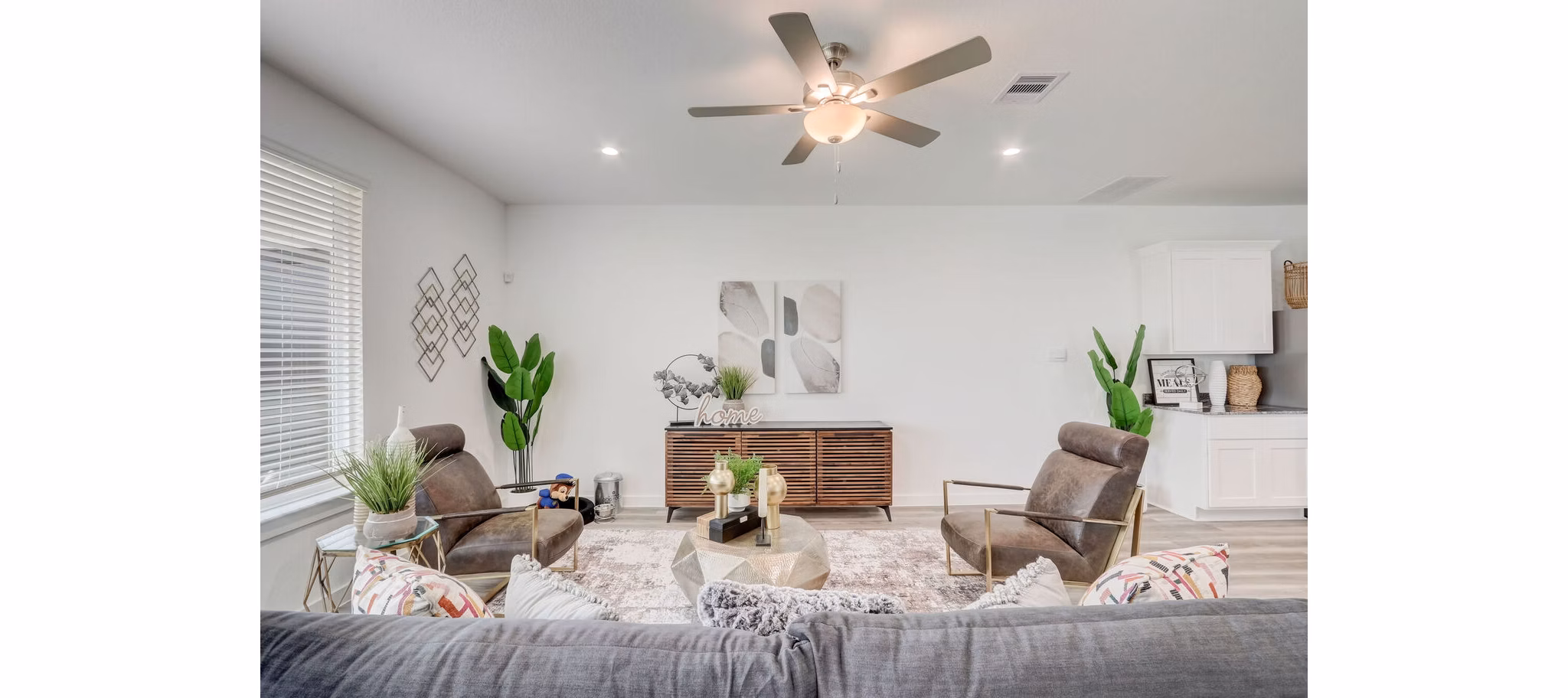 living room at The Oaks at Grand West Apartment Homes