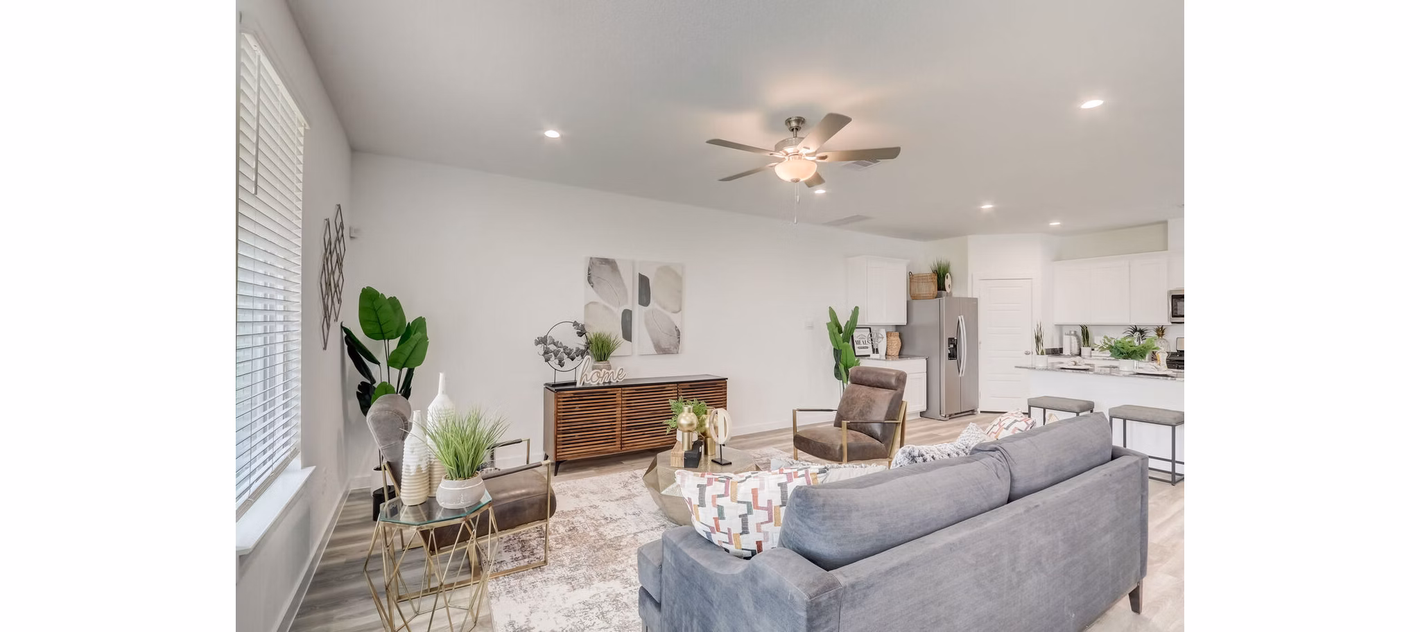 living room at The Oaks at Grand West Apartment Homes
