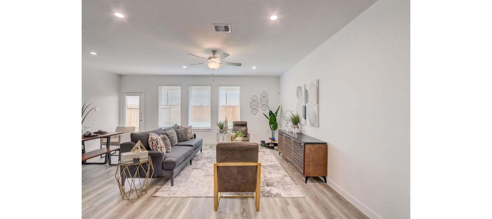 living room at The Oaks at Grand West Apartment Homes
