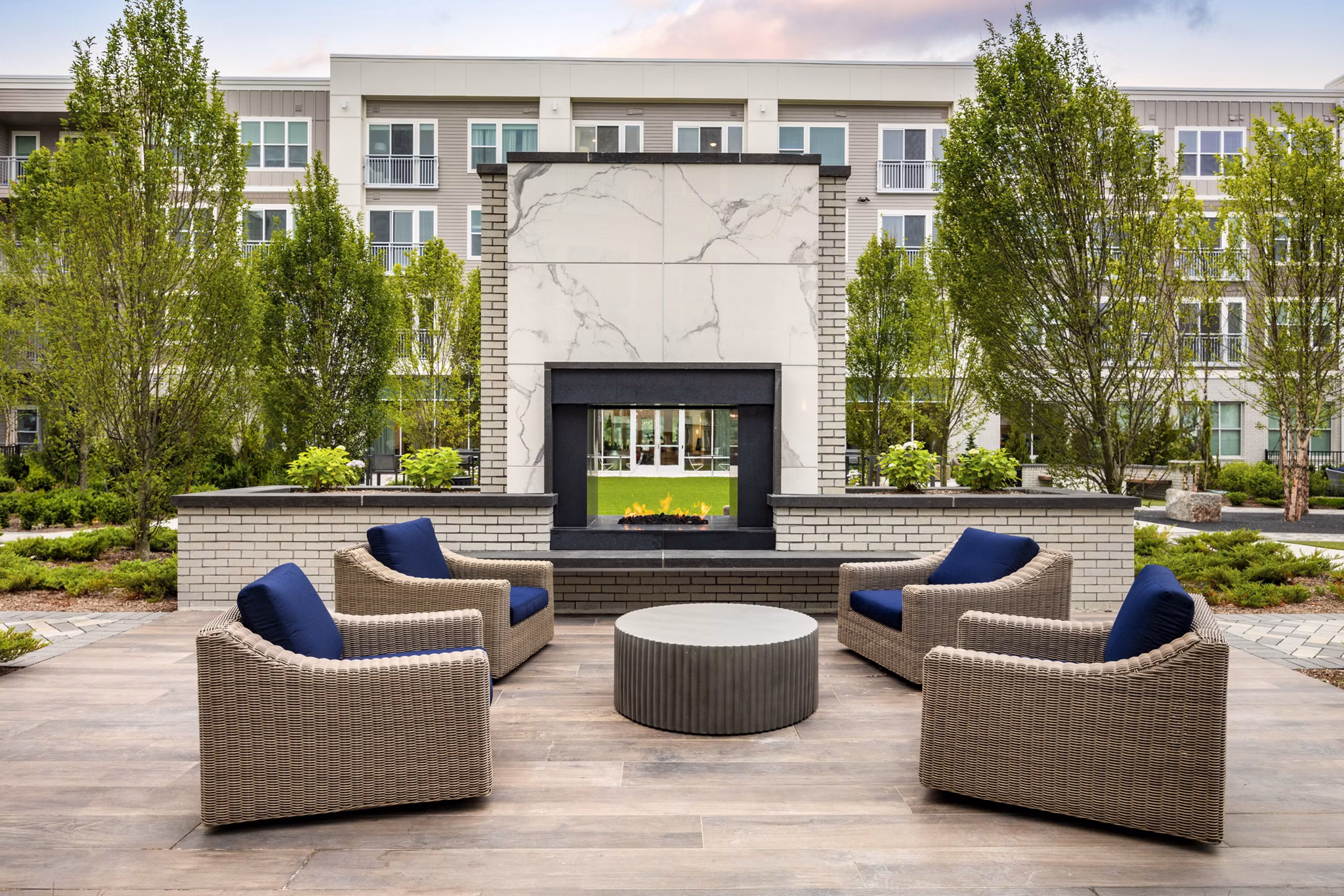 fire pit/patio at Hanover Hyannis Apartments