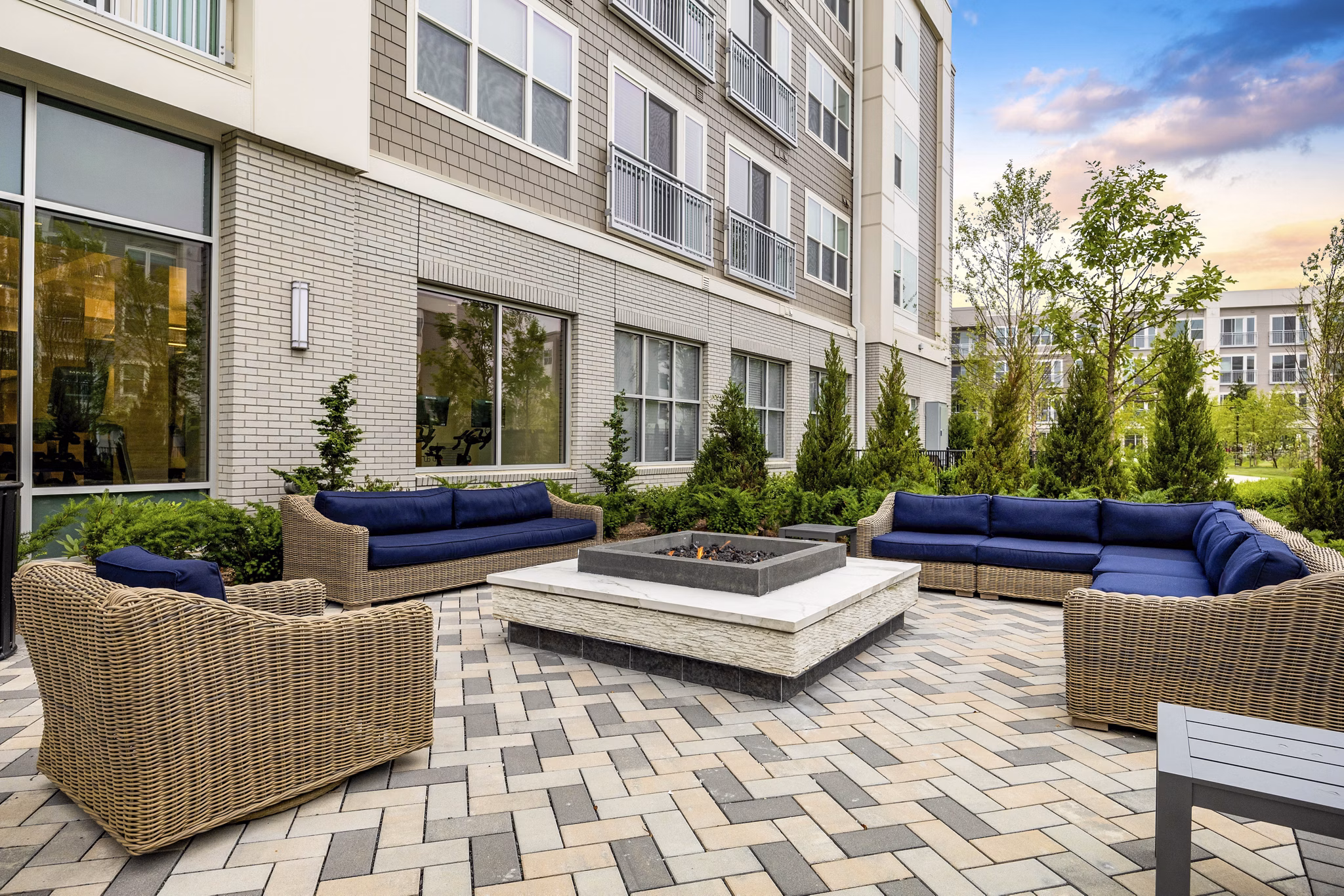 fire pit/patio at Hanover Hyannis Apartments