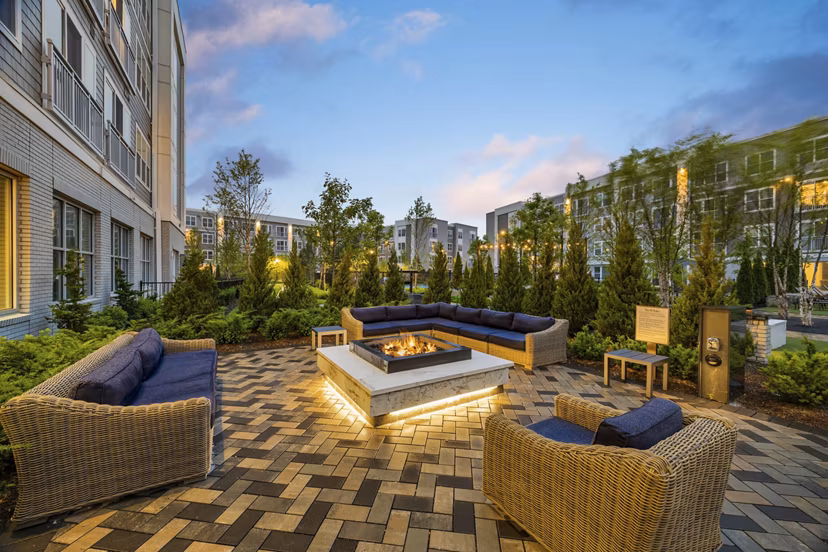 fire pit/patio at Hanover Hyannis Apartments