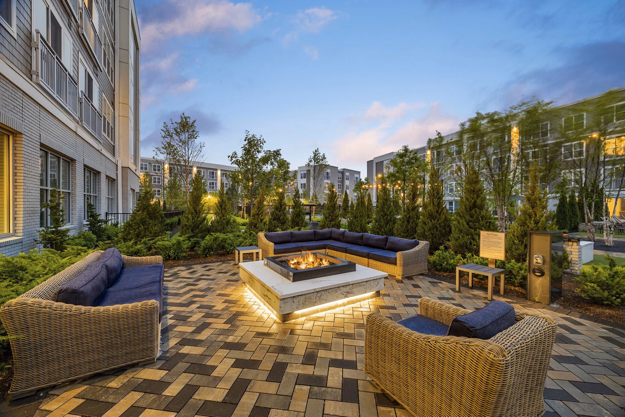 fire pit/patio at Hanover Hyannis Apartments