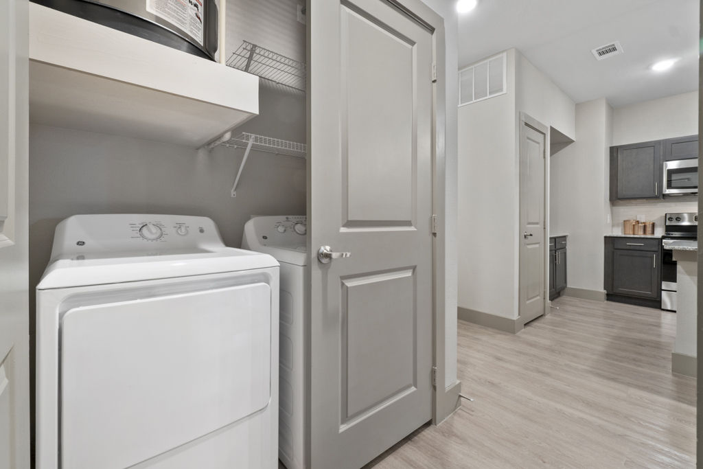 Laundry room at Dominion At Mercer Crossing