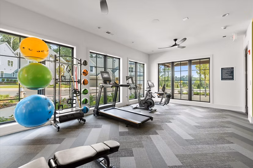 fitness center at Hayloft Holly Springs Apartments