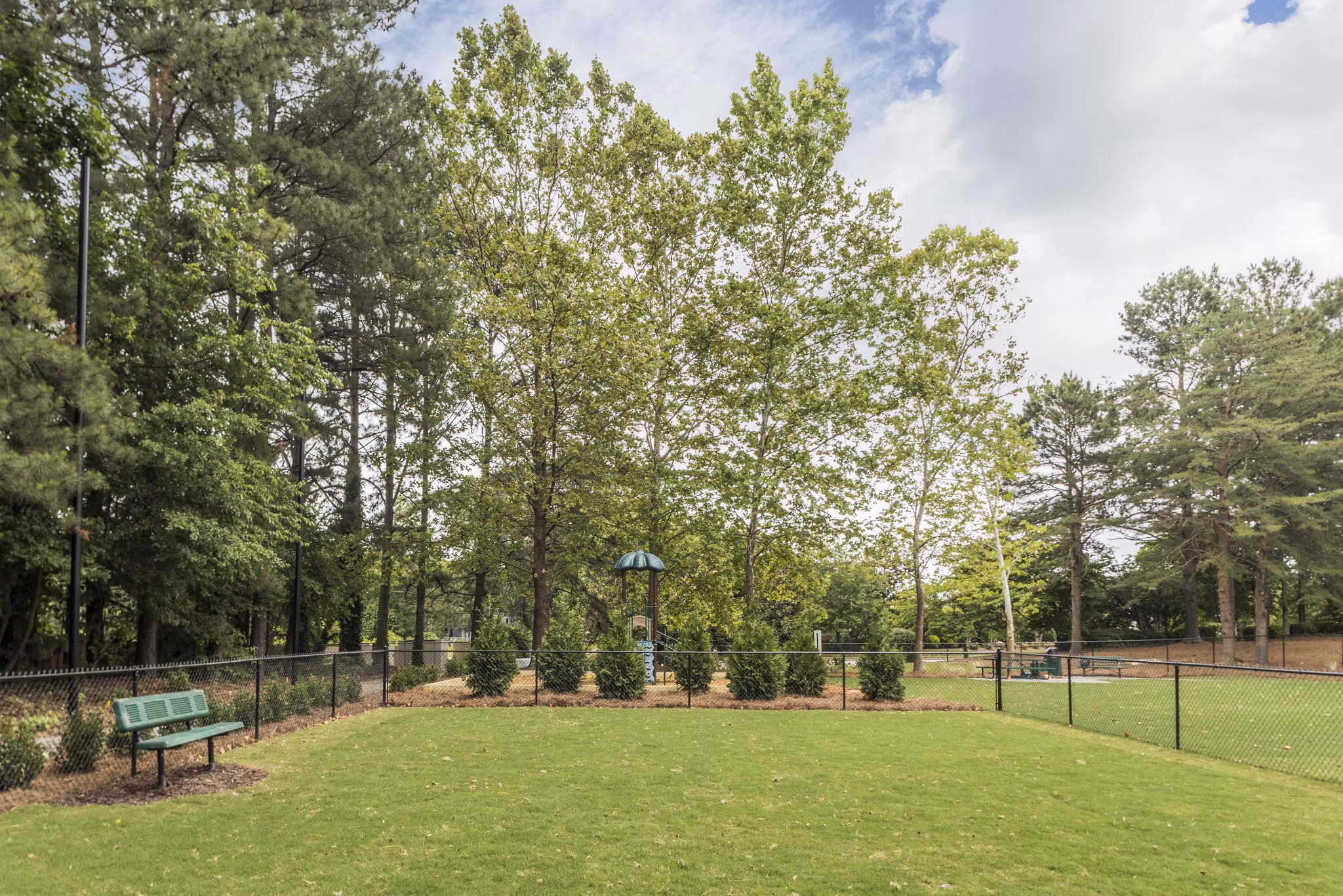 dog park at Crestmont Apartments Apartments