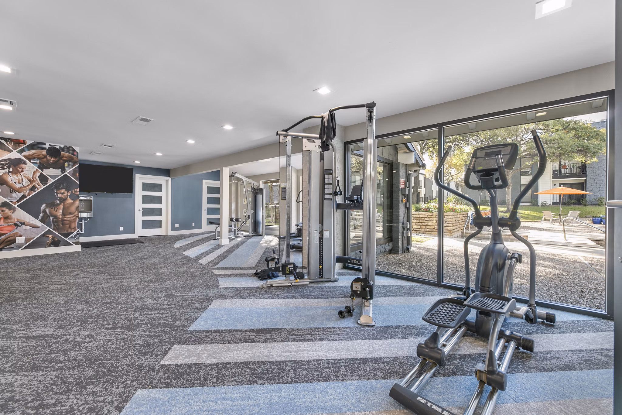 fitness center at The Retreat at River Ranch Apartments 