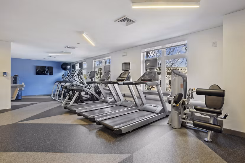 fitness center at Deco Apartments