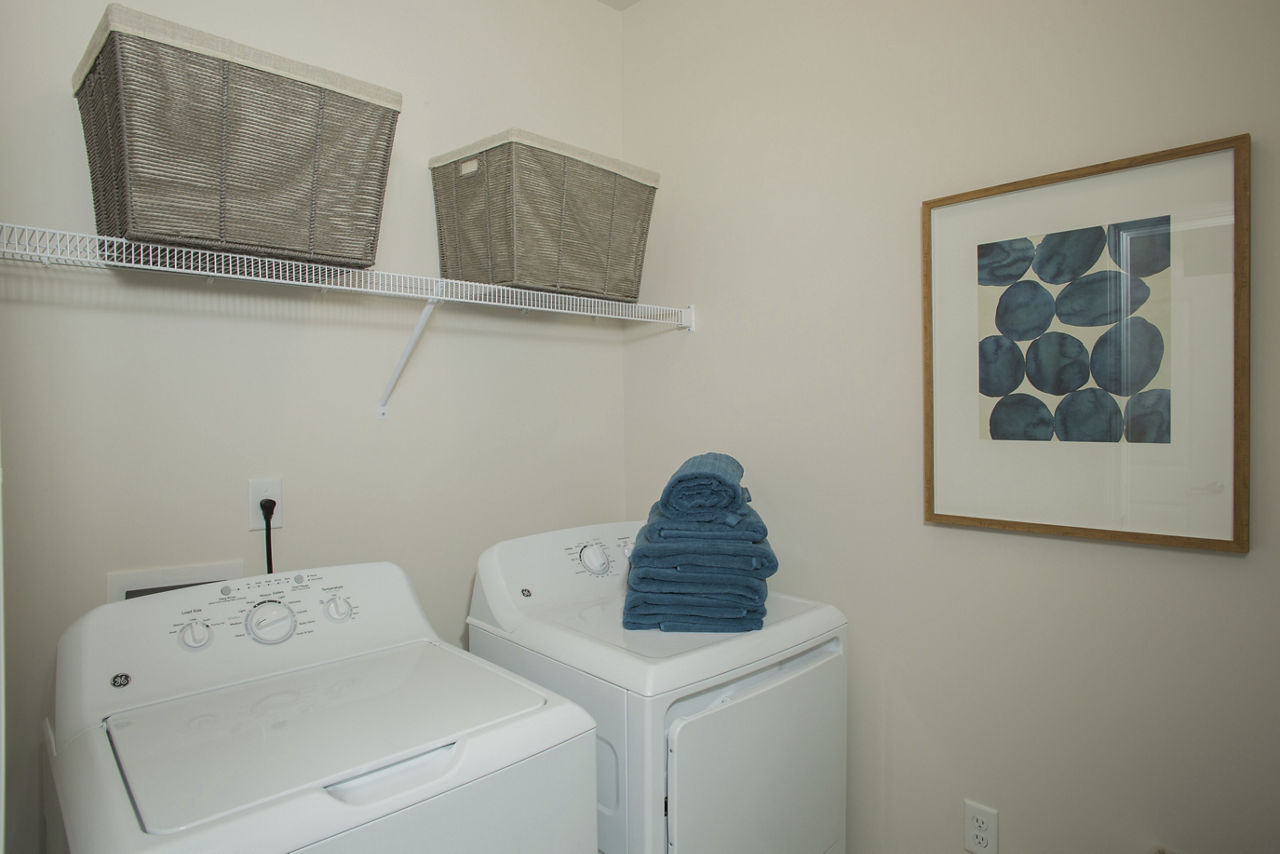 Laundry room at Waterleaf At Murrells Inlet Apartments