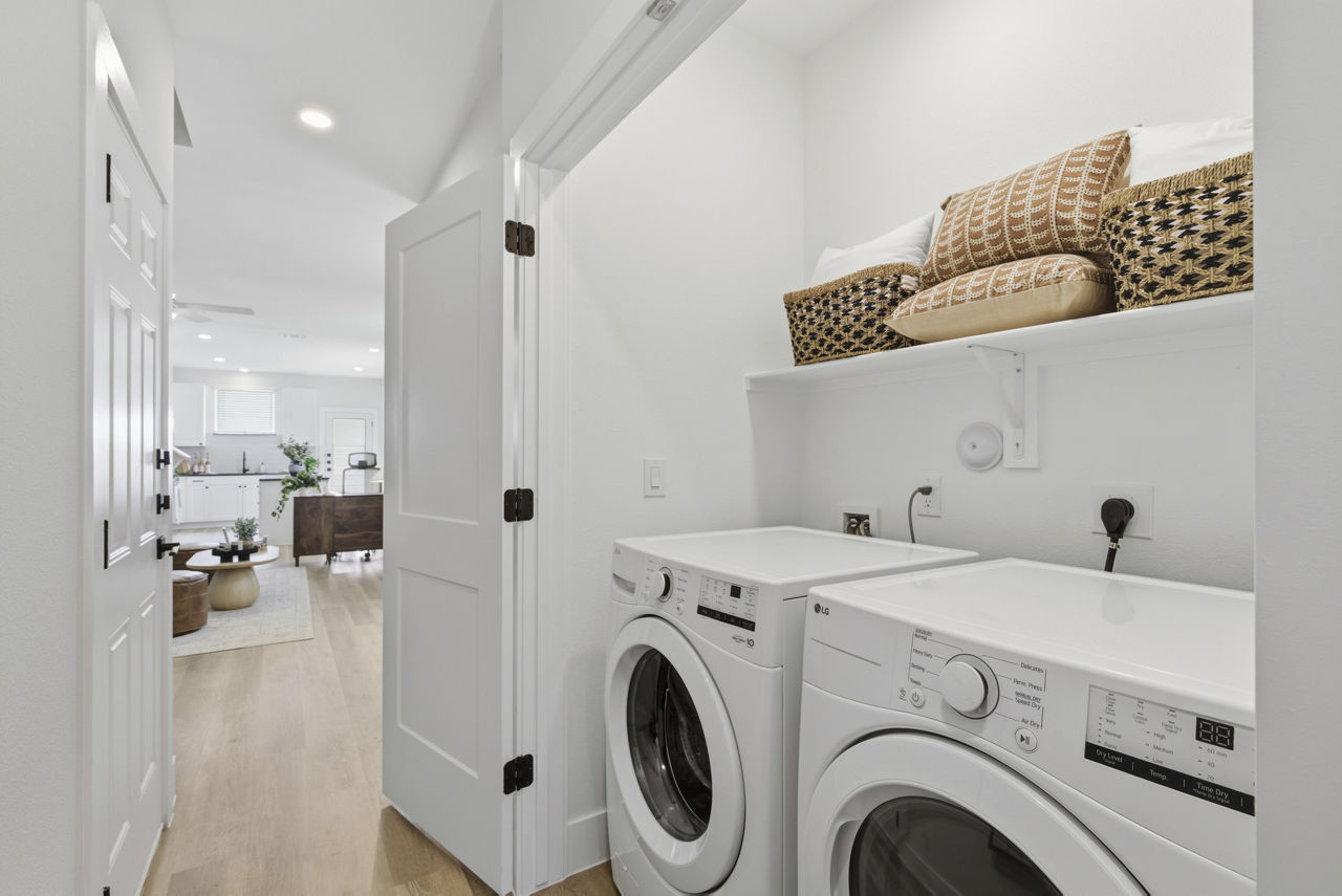 Laundry room at Harmon Melissa By Crescent Communities
