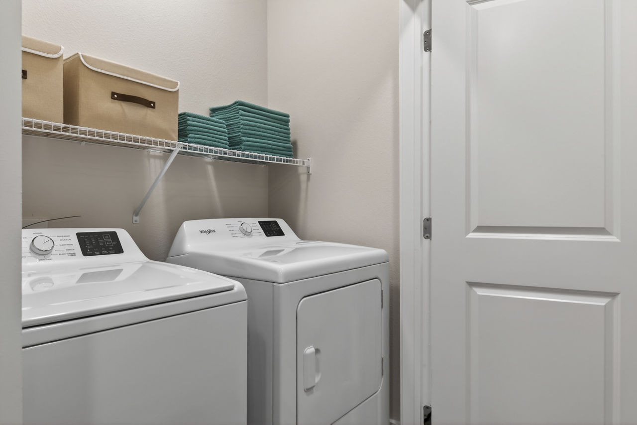 Laundry room at Postmaster Flats
