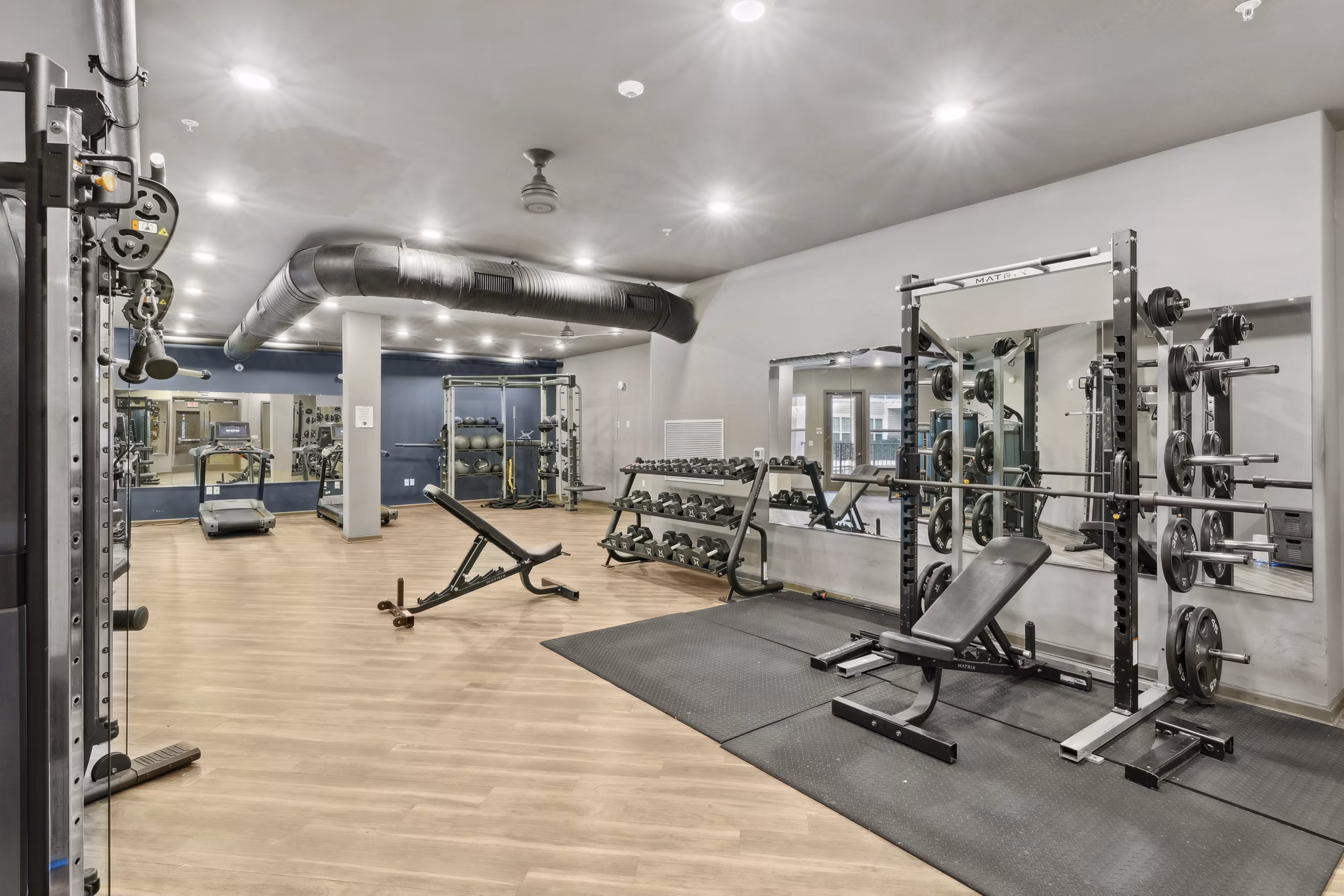 fitness center at Nexus Apartments