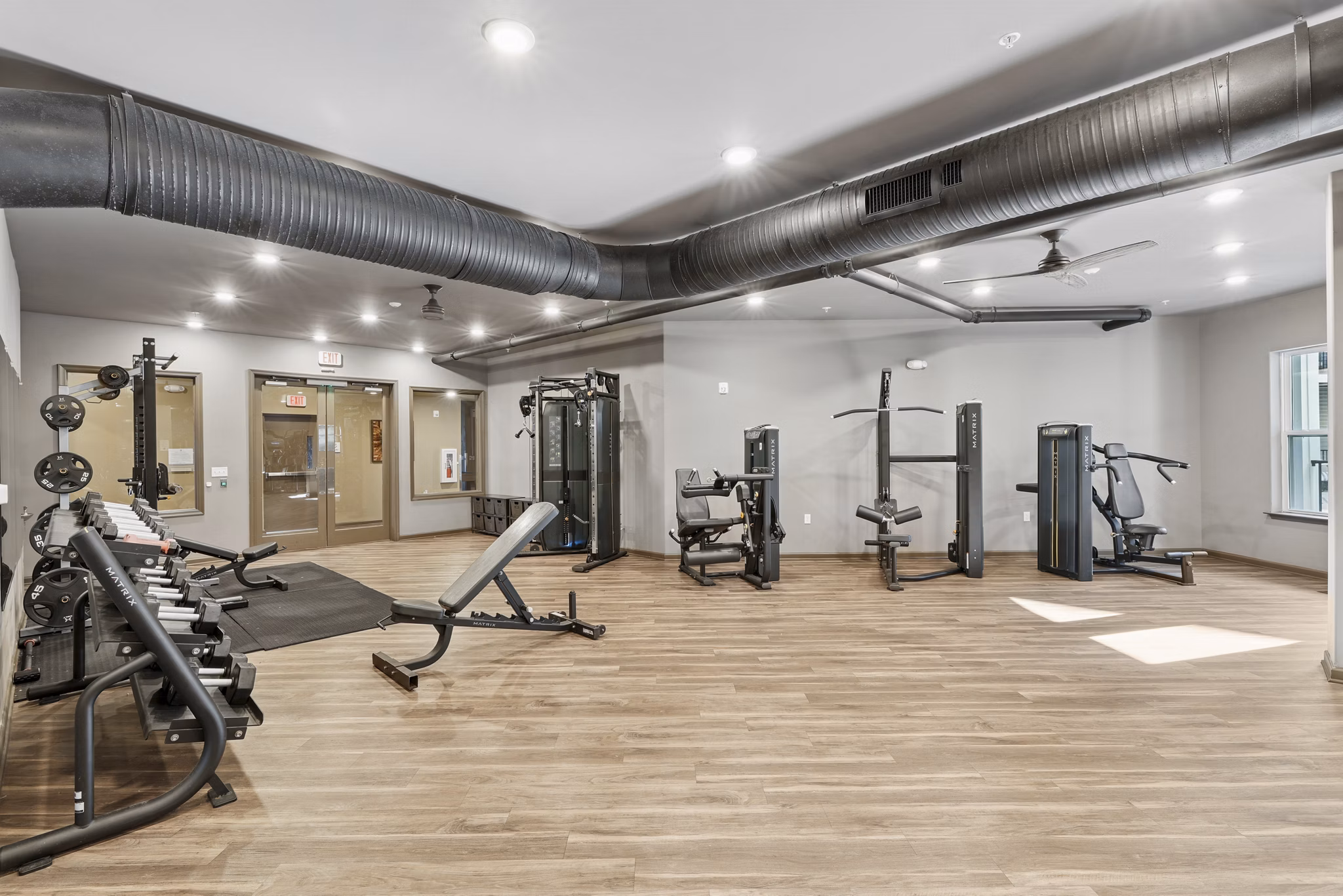 fitness center at Nexus Apartments