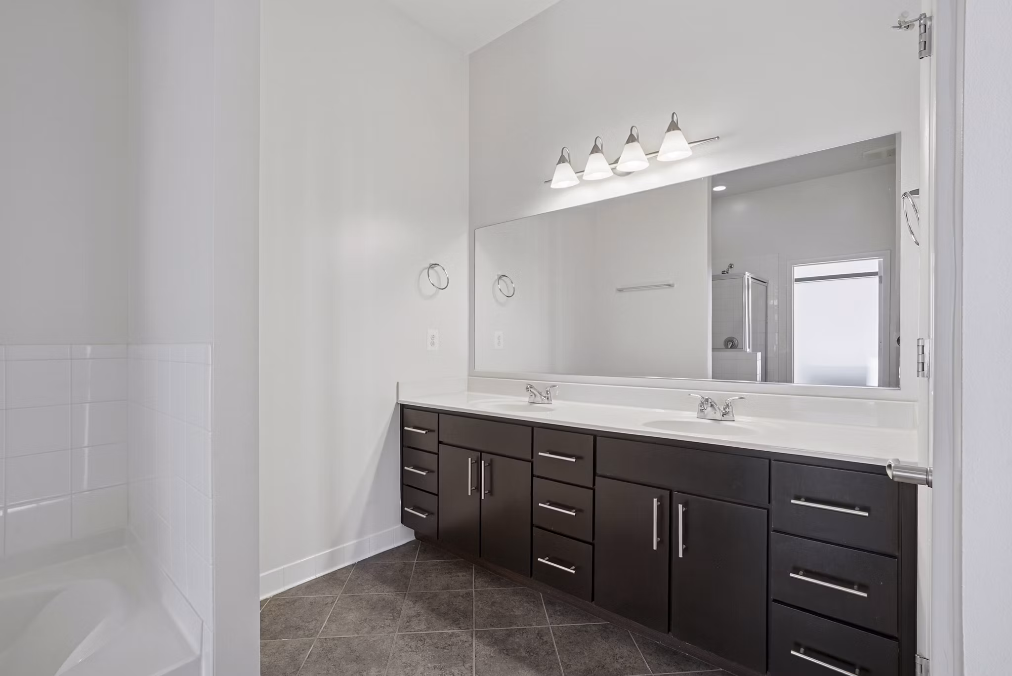 bathroom at Millennium at National Landing Apartments