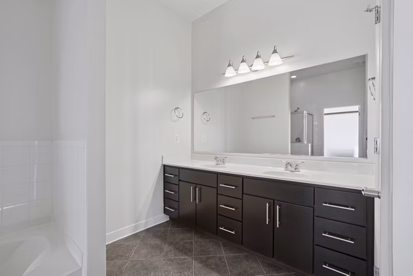 bathroom at Millennium at National Landing Apartments