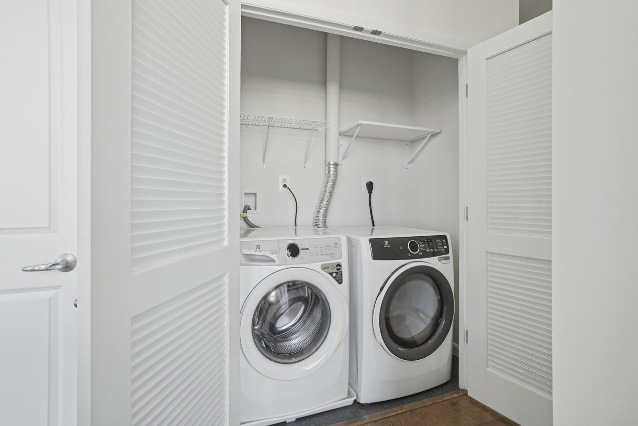 Laundry room at Millennium At National Landing