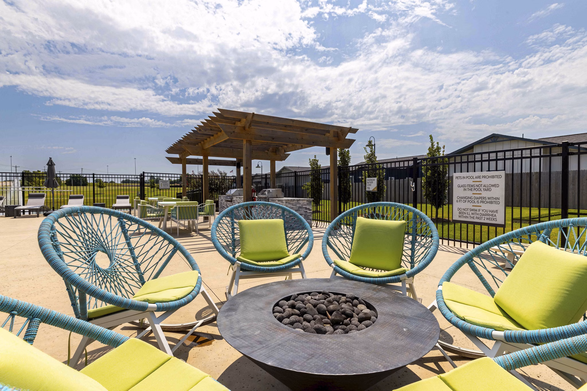 fire pit at Meadow + Main Apartments