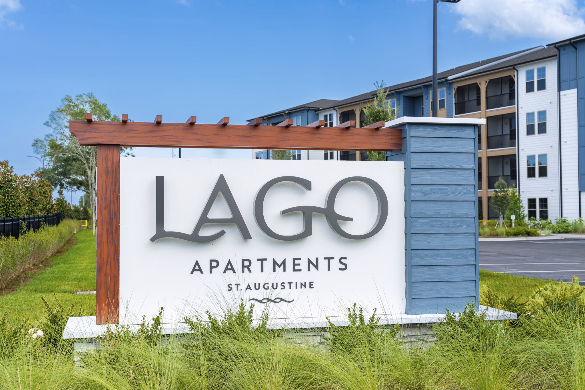 signage at Lago Apartments