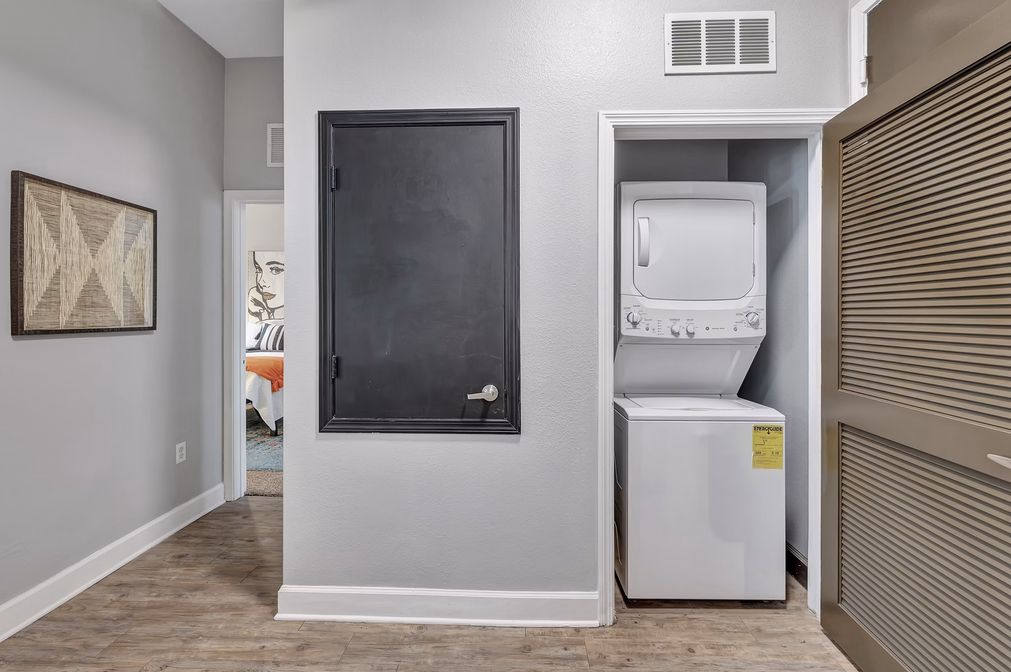 laundry room at Iconic on Alvarado Apartments