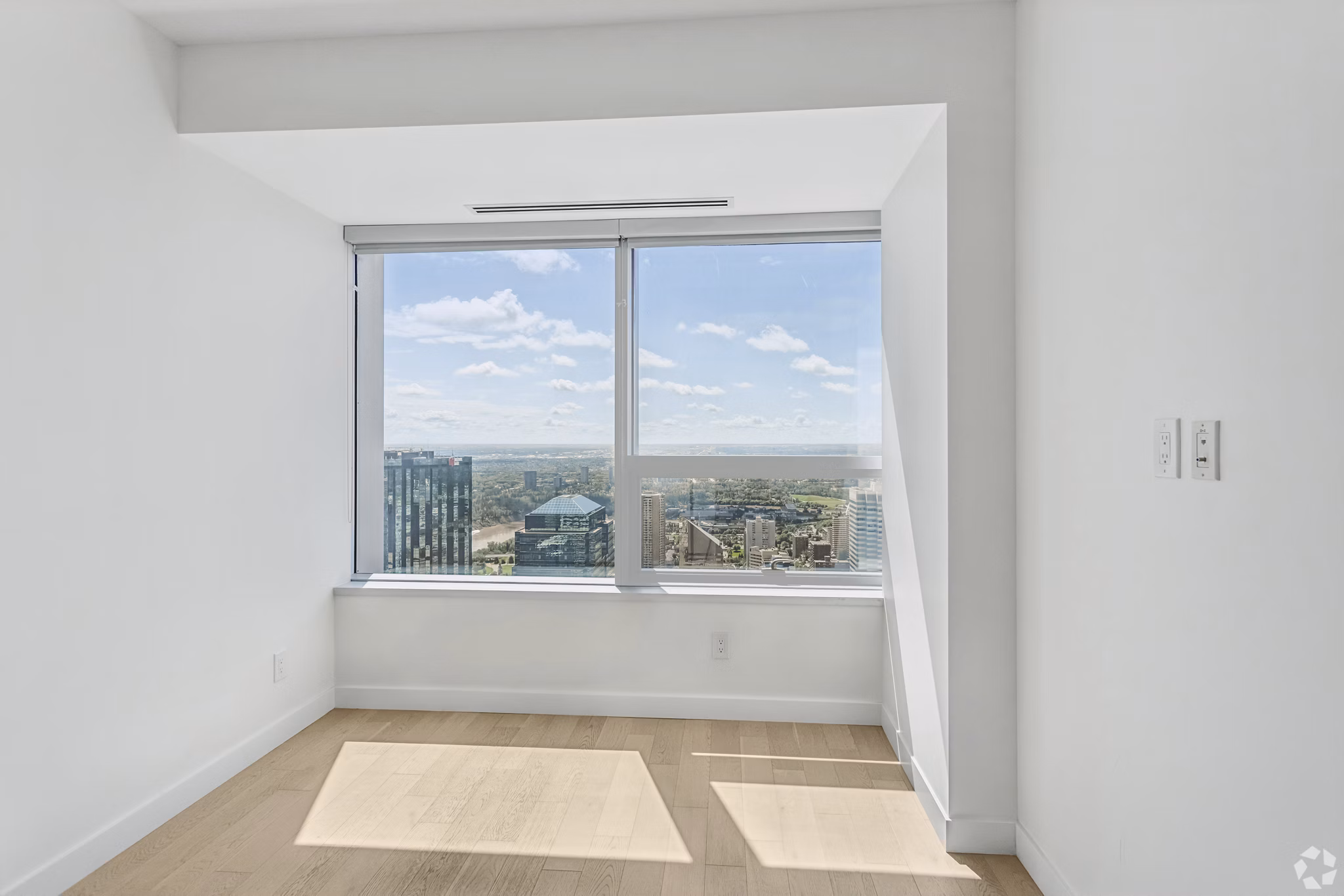 bedroom at SKY Signature Suites Apartments 