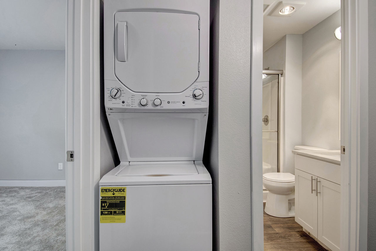 Laundry room at Arbor Creek Apartments