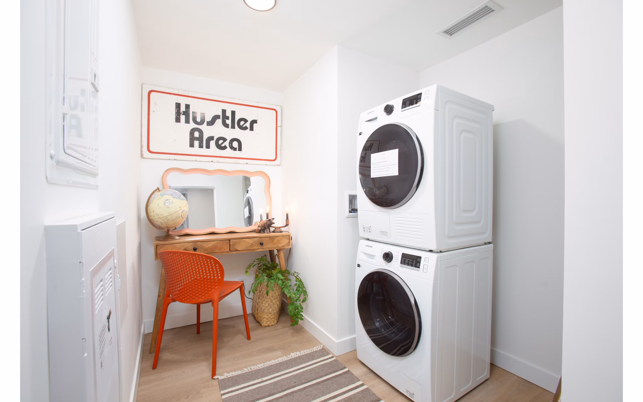 laundry room at HIVE Apartments