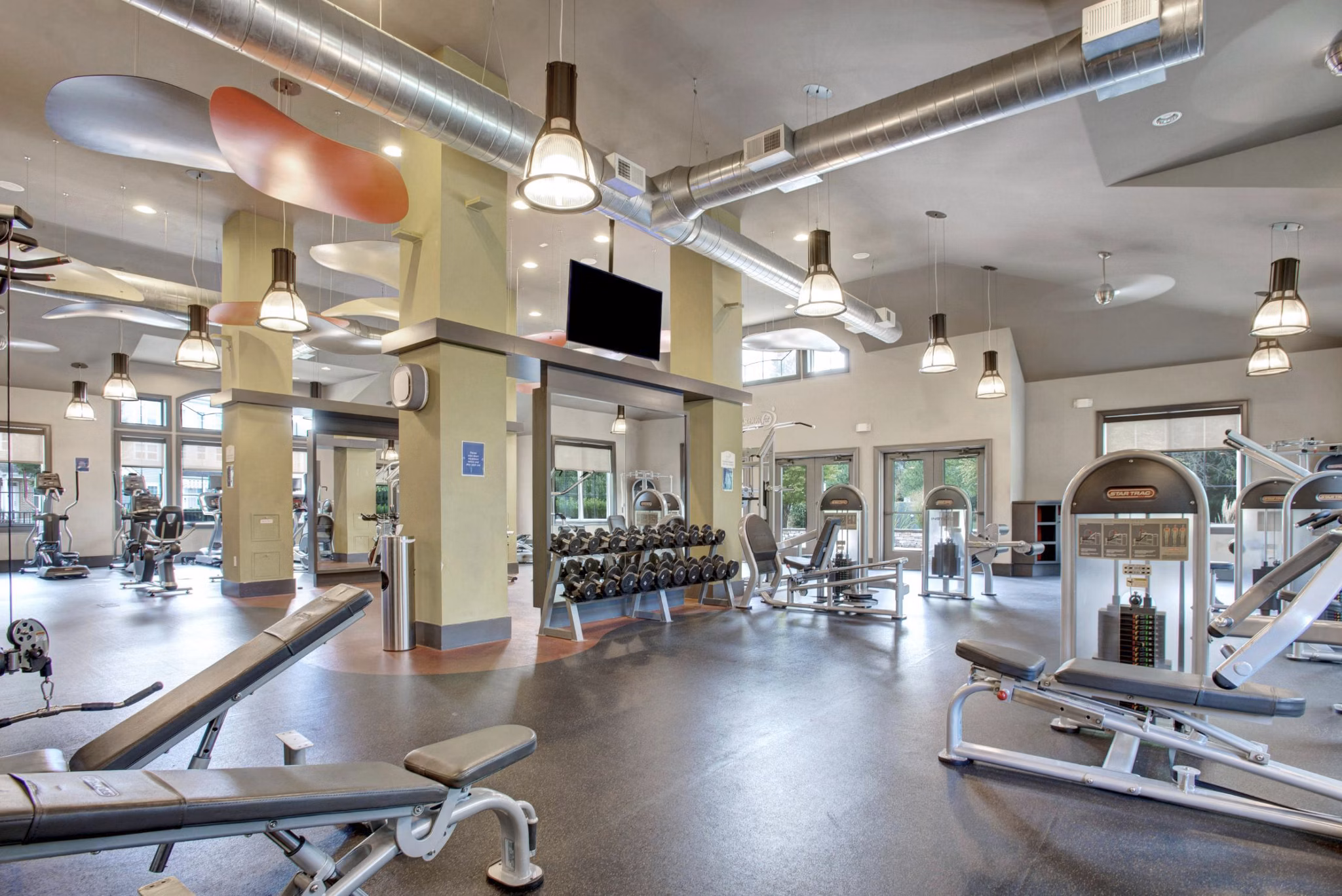 fitness center at The Grove Somerset Apartments