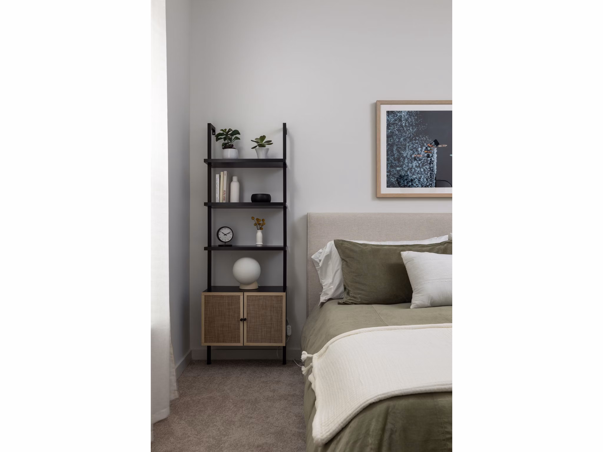 bedroom at The Leo LoSo Apartments