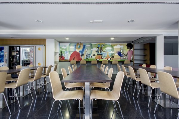 Clubhouse with modern design at Roberto de Nobili Residence Hall, a luxury apartment community by Greystar