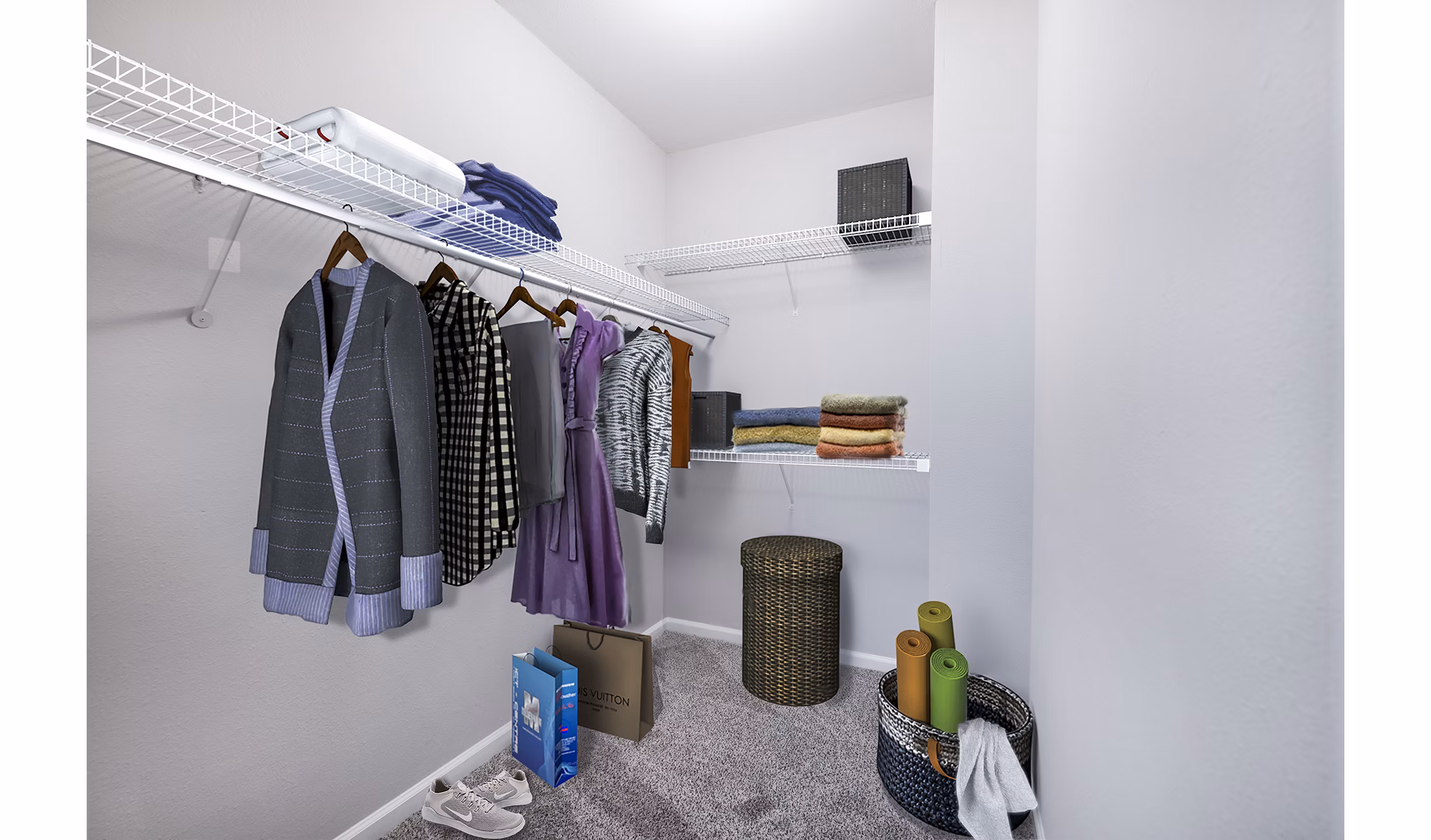 Spacious bedroom closet with custom shelving at Jefferson at Dedham Station Apartments, offering ample storage solutions for organized living