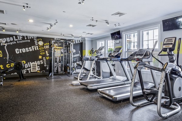 State-of-the-art fitness center at Jefferson at Dedham Station Apartments, featuring modern equipment and spacious workout areas