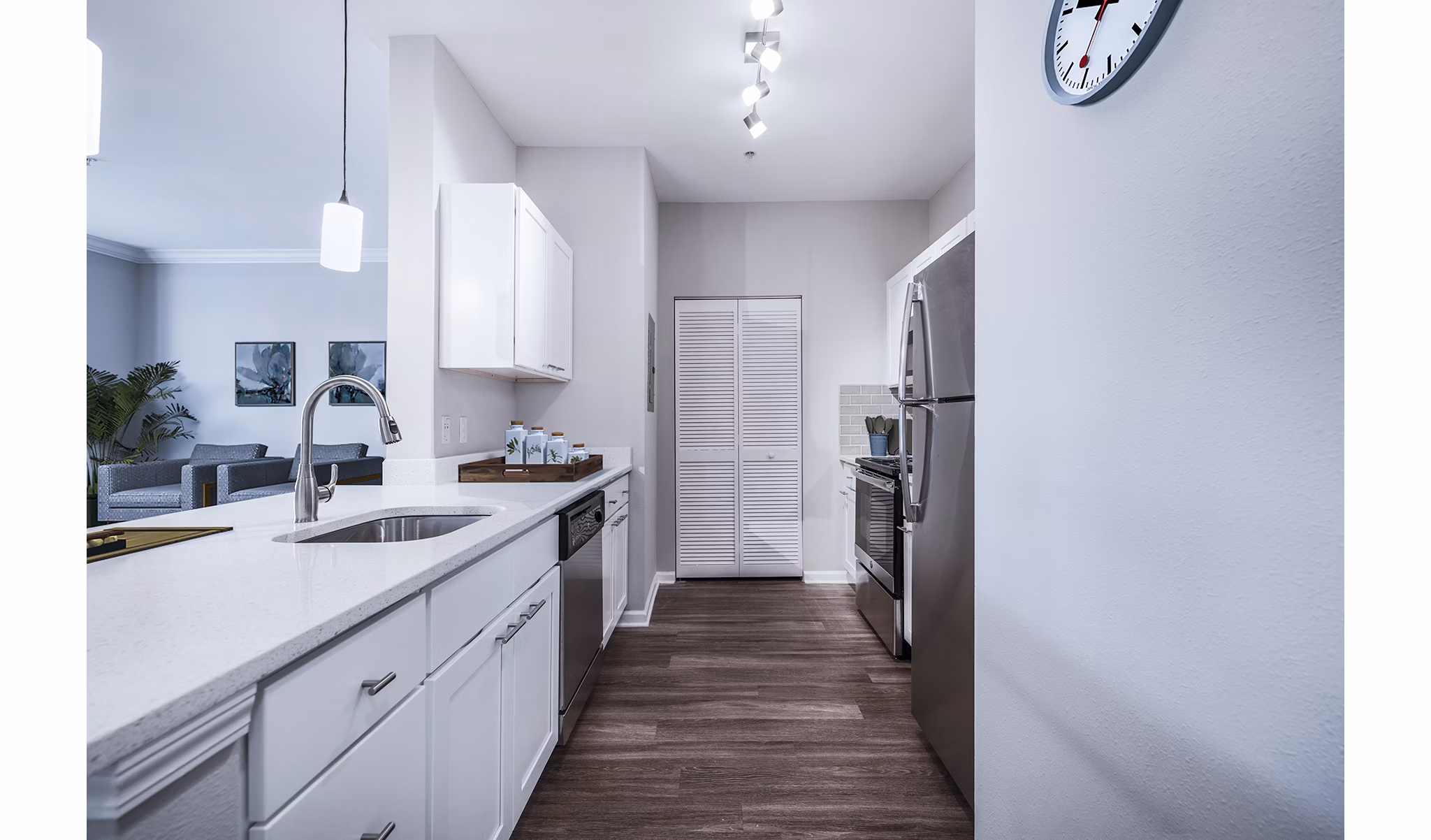 Modern kitchen with stainless steel appliances at Jefferson at Dedham Station Apartments