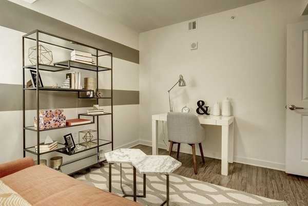 Modern home office with natural lighting at 100 Capitol Yards Apartments