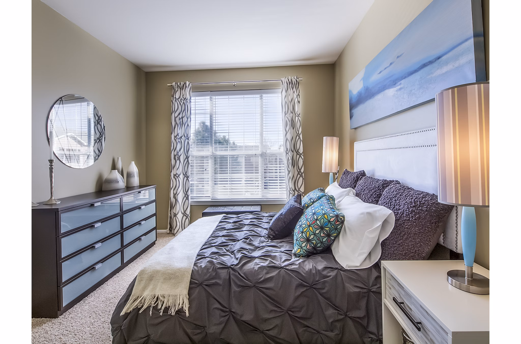 Cozy bedroom with modern design elements at  luxury apartments