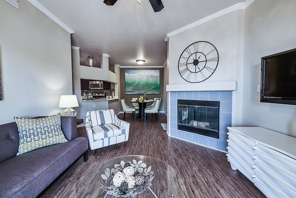 Spacious living room with modern furnishings at Monte Vista Apartments