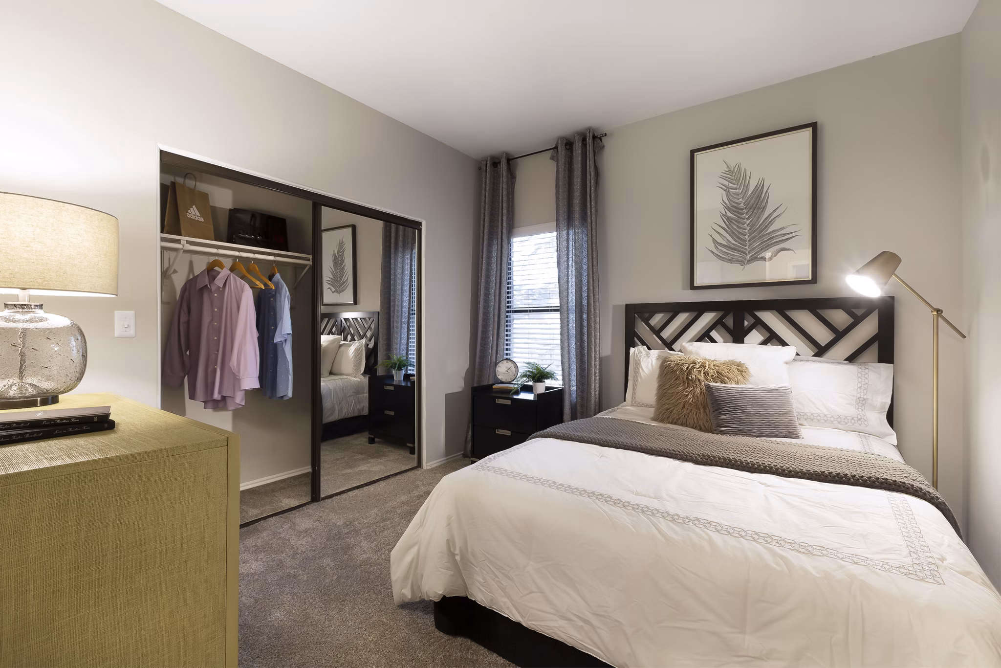 Elegant bedroom with natural light at Hardrock Canyon Apartments, offering luxury living in the heart of Austin