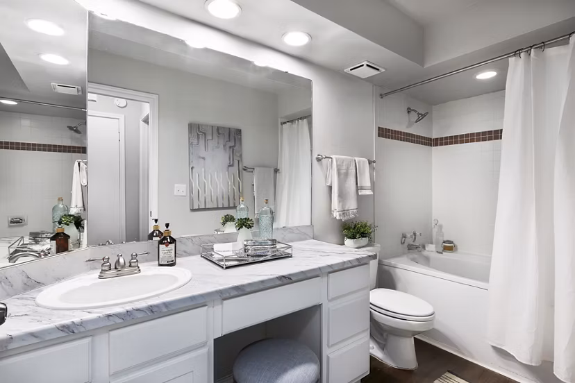 Luxurious bathroom with granite countertops and modern fixtures in Hardrock Canyon Apartments