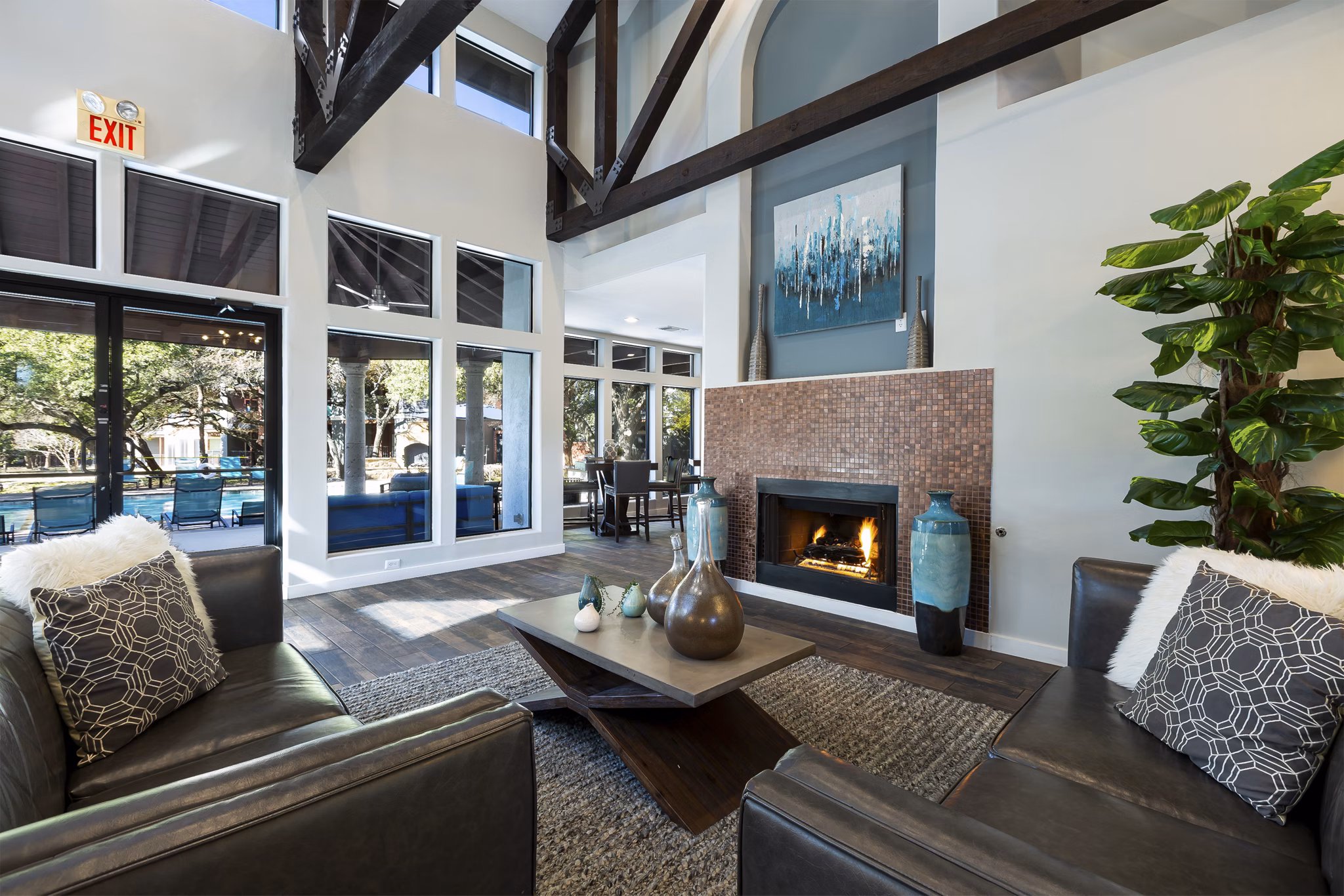 Clubhouse with modern decor and seating at Hardrock Canyon Apartments for social gatherings
