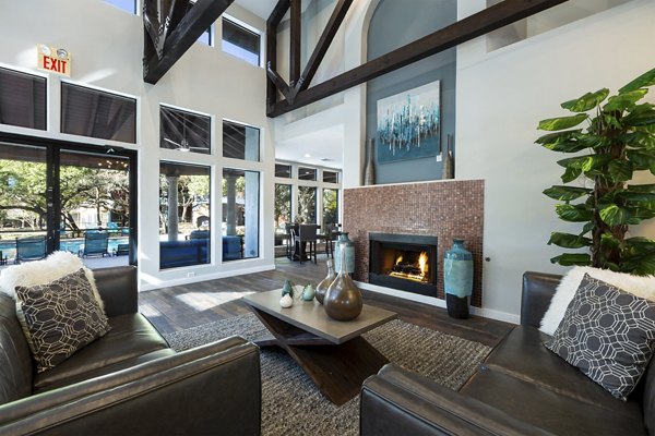 Clubhouse with modern decor and seating at Hardrock Canyon Apartments for social gatherings