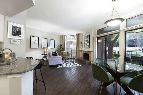 Dining area featuring elegant furnishings and natural light at Hardrock Canyon Apartments, luxury living by Greystar