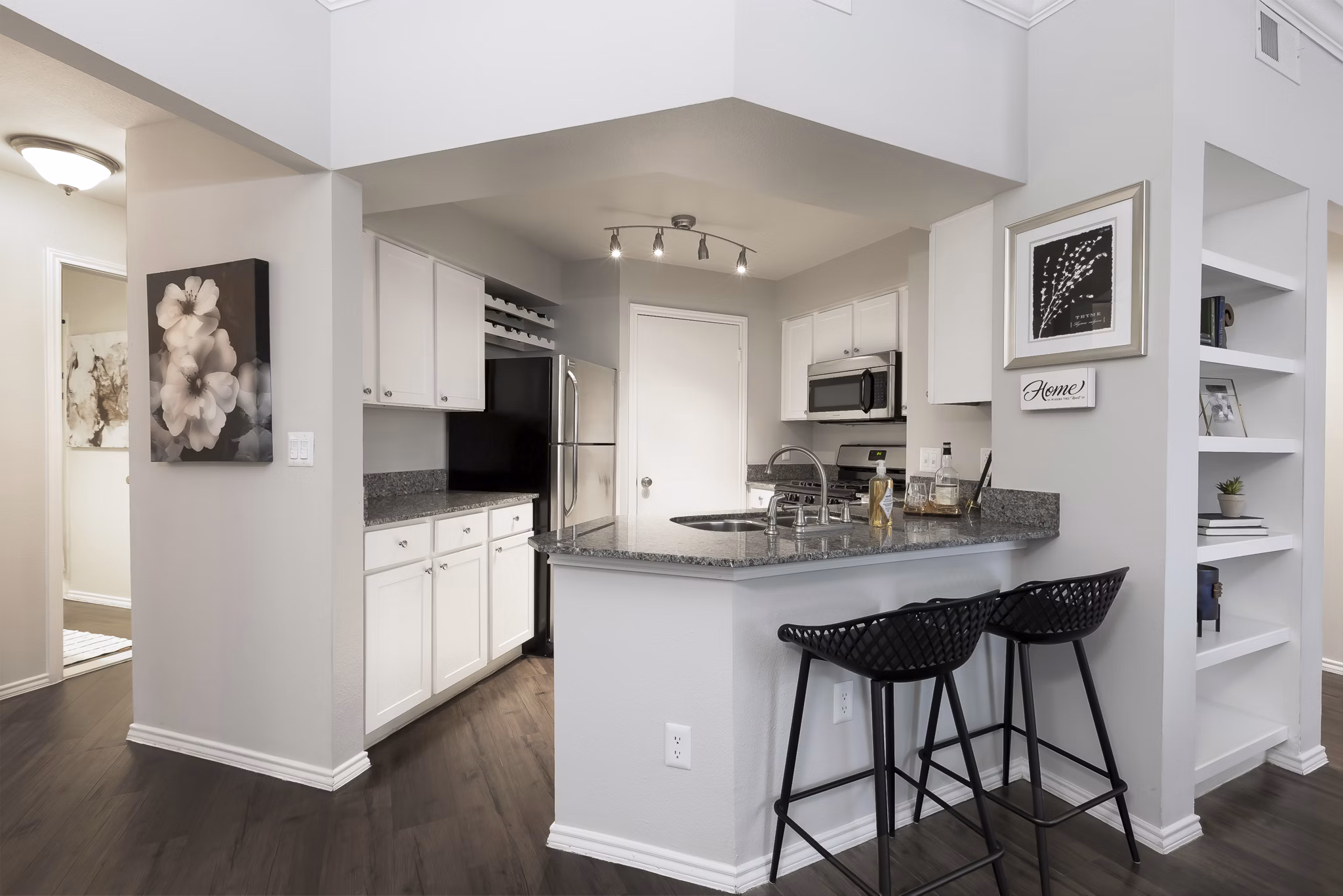 Modern kitchen with stainless steel appliances at Hardrock Canyon Apartments, a luxury living community